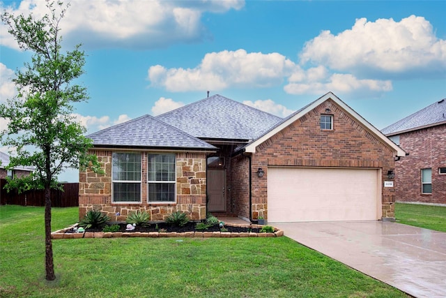 ranch-style house featuring a front lawn, stone siding, roof with shingles, concrete driveway, and an attached garage