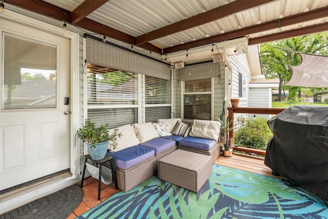 deck featuring an outdoor living space and grilling area