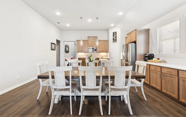 dining room with recessed lighting, dark wood-style flooring, and baseboards