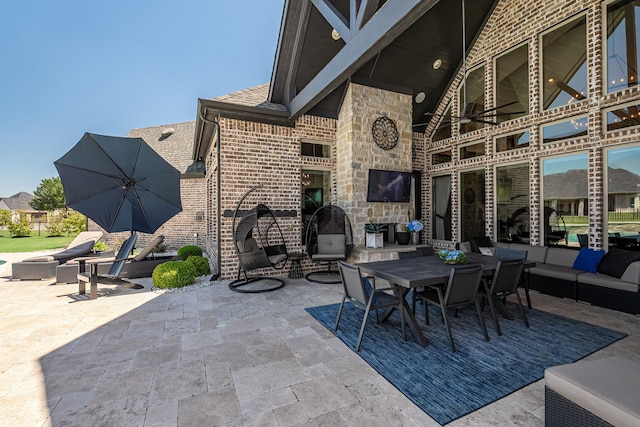 view of patio / terrace with outdoor dining area and an outdoor living space