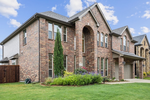 traditional-style house with an attached garage and brick siding