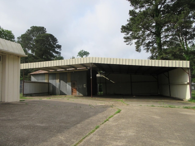 exterior space featuring a carport