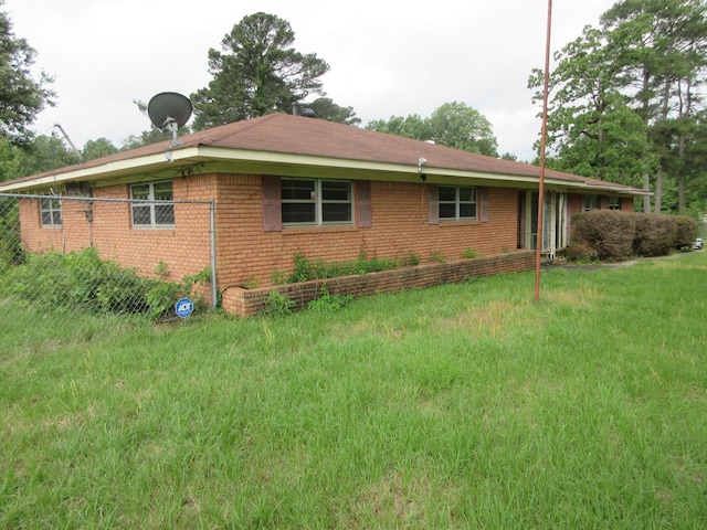 view of side of property with brick siding