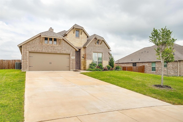 view of front of house with brick siding, fence, central AC unit, and a front lawn