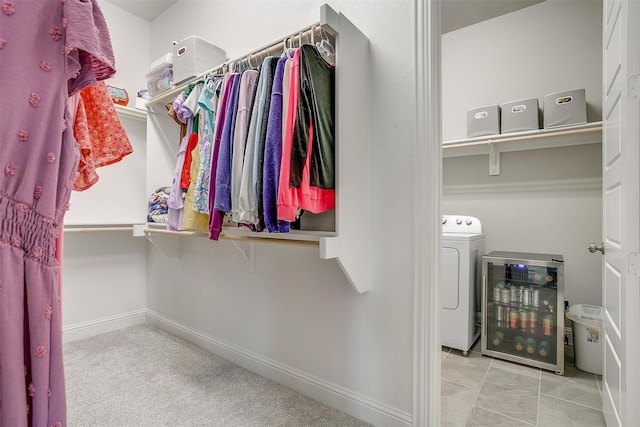 spacious closet with washer / dryer and beverage cooler