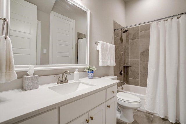 bathroom with toilet, tile patterned floors, shower / bath combo, and vanity
