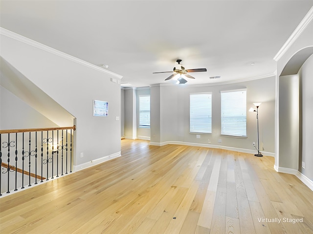 2500 Rockbrook Dr Unit 81, Lewisville, TX 75067 - unfurnished room with crown molding, baseboards, a ceiling fan, and light wood finished floors