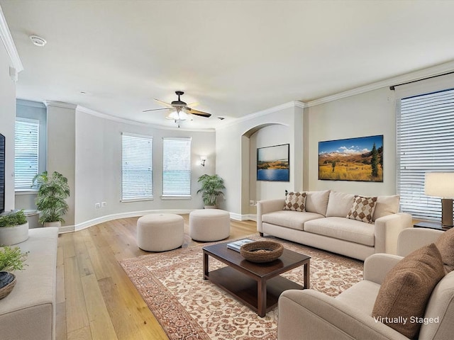 2500 Rockbrook Dr Unit 81, Lewisville, TX 75067 - living room featuring crown molding, baseboards, ceiling fan, and light wood-style flooring