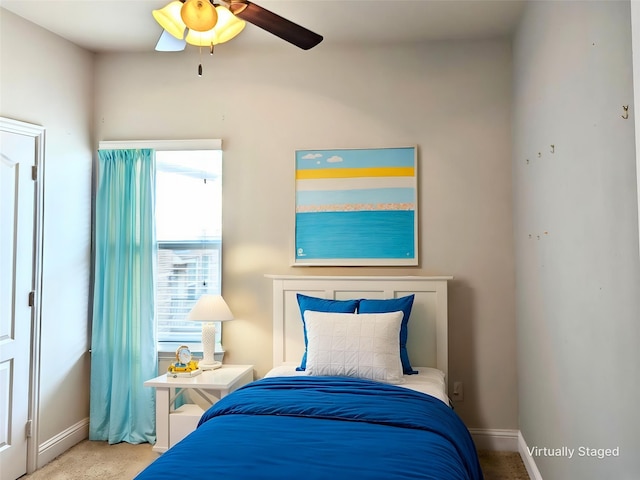 2500 Rockbrook Dr Unit 81, Lewisville, TX 75067 - bedroom with baseboards, multiple windows, carpet flooring, and ceiling fan