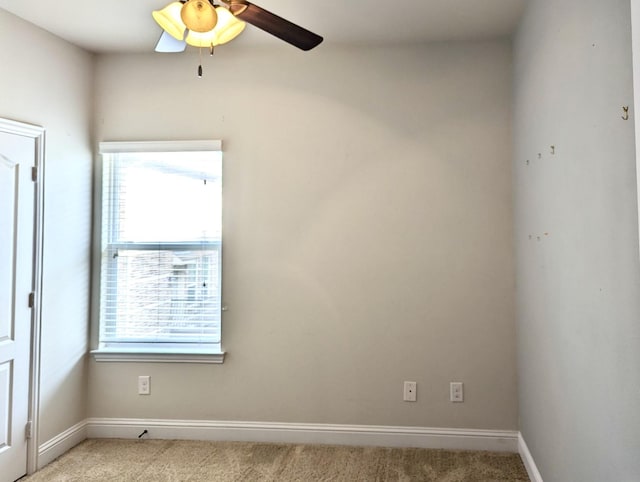 2500 Rockbrook Dr Unit 81, Lewisville, TX 75067 - empty room featuring baseboards, light colored carpet, and plenty of natural light
