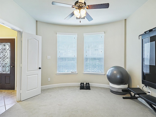 2500 Rockbrook Dr Unit 81, Lewisville, TX 75067 - exercise room with baseboards, ceiling fan, and light colored carpet