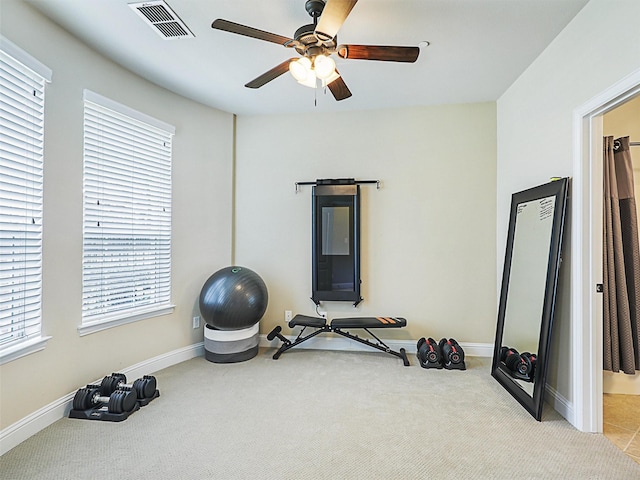 2500 Rockbrook Dr Unit 81, Lewisville, TX 75067 - exercise room with carpet flooring, ceiling fan, visible vents, and plenty of natural light