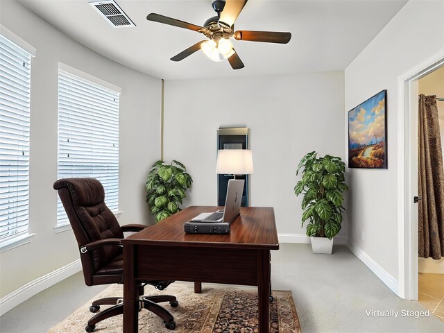 2500 Rockbrook Dr Unit 81, Lewisville, TX 75067 - office with visible vents, a ceiling fan, baseboards, and a healthy amount of sunlight