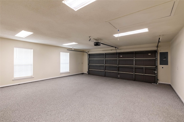 401 Mara Ln, Red Oak, TX 75154 - garage with baseboards, a garage door opener, and electric panel