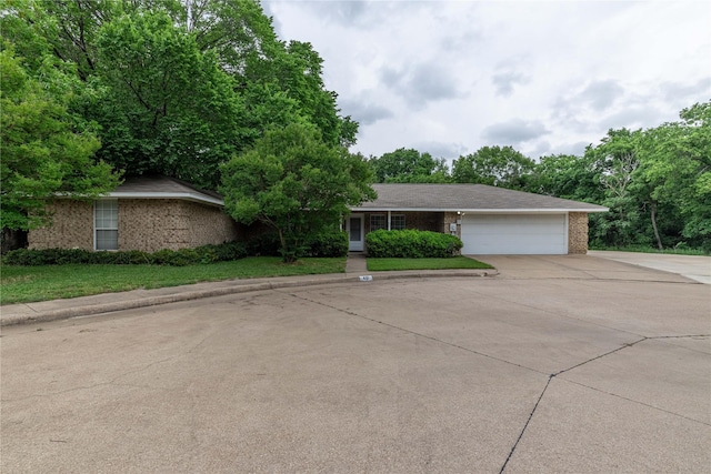 401 Mara Ln, Red Oak, TX 75154 - ranch-style home with brick siding, an attached garage, and driveway