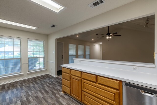 401 Mara Ln, Red Oak, TX 75154 - kitchen with stainless steel dishwasher, brown cabinets, visible vents, and dark wood-style floors