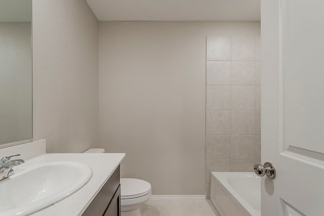 full bath featuring vanity, tile patterned floors, and toilet