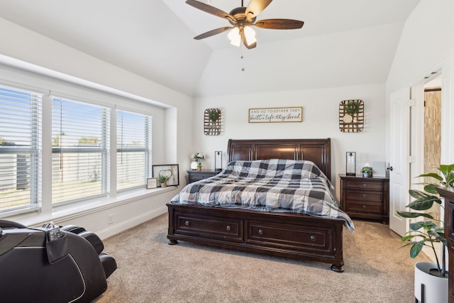 bedroom featuring baseboards, ceiling fan, light carpet, and vaulted ceiling