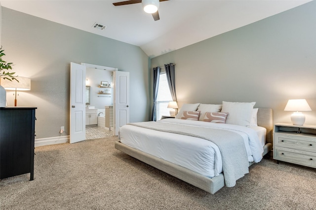 9816 Hedge Bell Dr, Mckinney, TX 75072 - carpeted bedroom featuring visible vents, lofted ceiling, baseboards, connected bathroom, and a ceiling fan