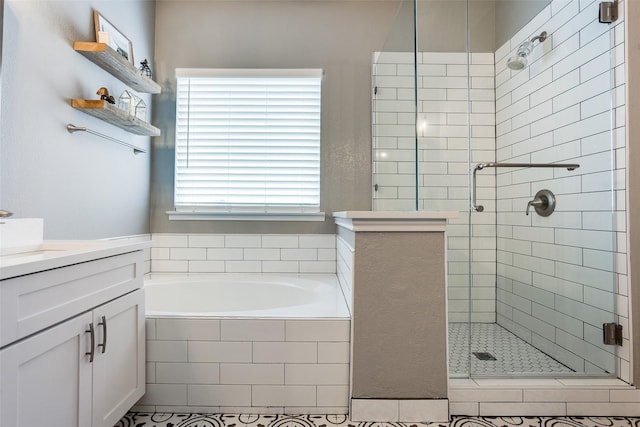 9816 Hedge Bell Dr, Mckinney, TX 75072 - full bathroom featuring vanity, a stall shower, and a garden tub