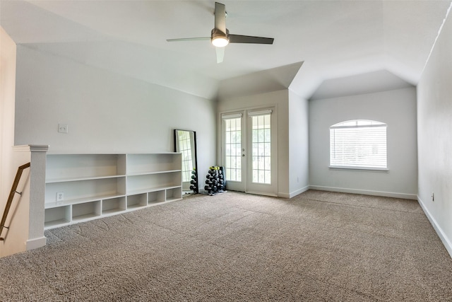 9816 Hedge Bell Dr, Mckinney, TX 75072 - unfurnished living room with carpet floors, baseboards, ceiling fan, and lofted ceiling