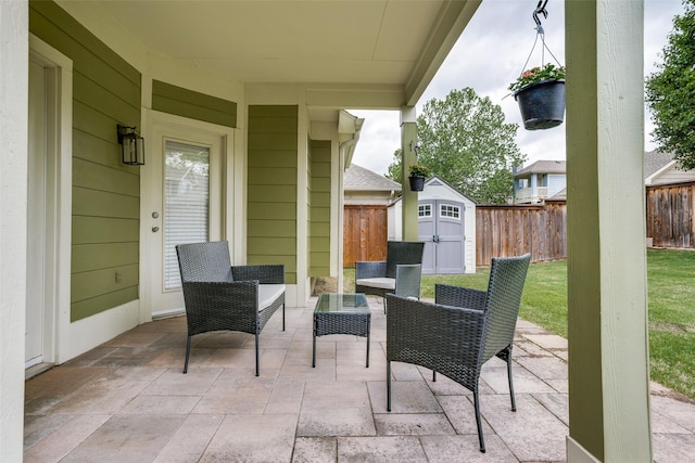 9816 Hedge Bell Dr, Mckinney, TX 75072 - view of patio with a storage shed, an outbuilding, and a fenced backyard