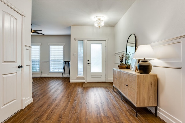 9816 Hedge Bell Dr, Mckinney, TX 75072 - entrance foyer featuring baseboards, dark wood-style floors, and an inviting chandelier