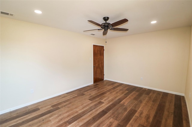 empty room featuring ceiling fan, recessed lighting, visible vents, and wood finished floors