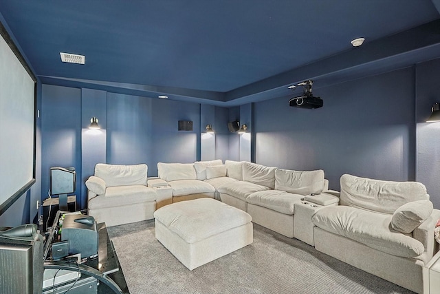 home theater featuring carpet flooring and visible vents