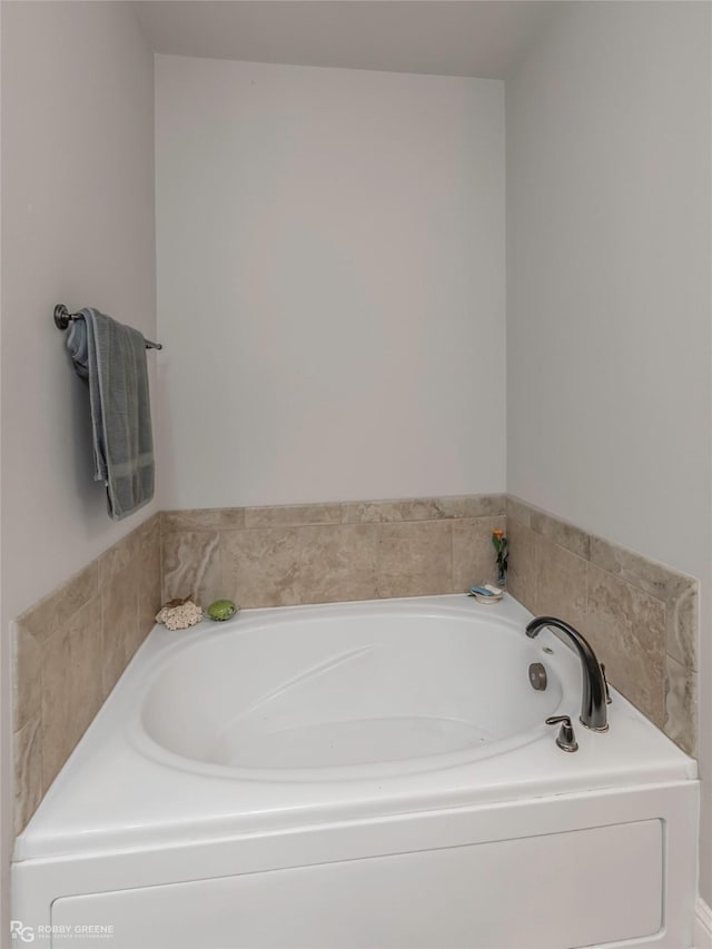 full bath featuring a garden tub