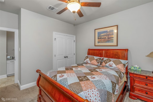 bedroom featuring baseboards, a ceiling fan, light colored carpet, and visible vents