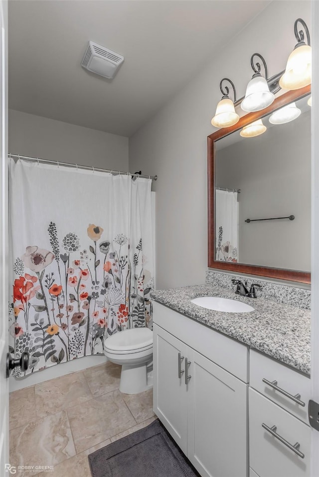 full bath featuring toilet, visible vents, and vanity
