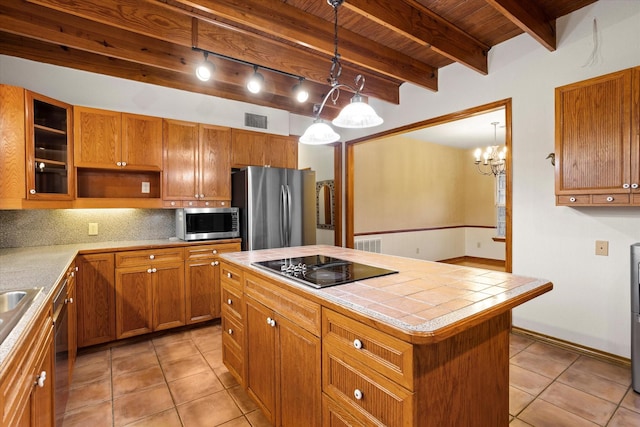 kitchen featuring visible vents, tile countertops, wooden ceiling, light tile patterned floors, and stainless steel appliances