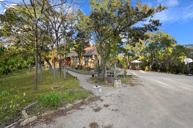 view of property hidden behind natural elements