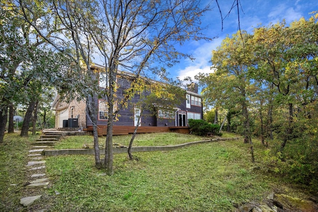 view of yard with a garage