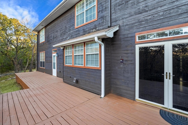 wooden terrace featuring french doors