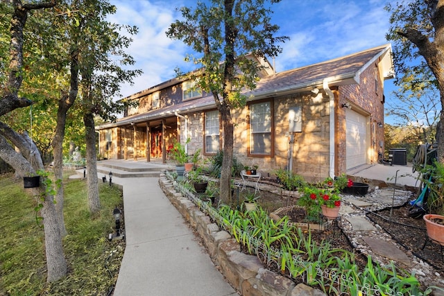 view of front of property with a shingled roof