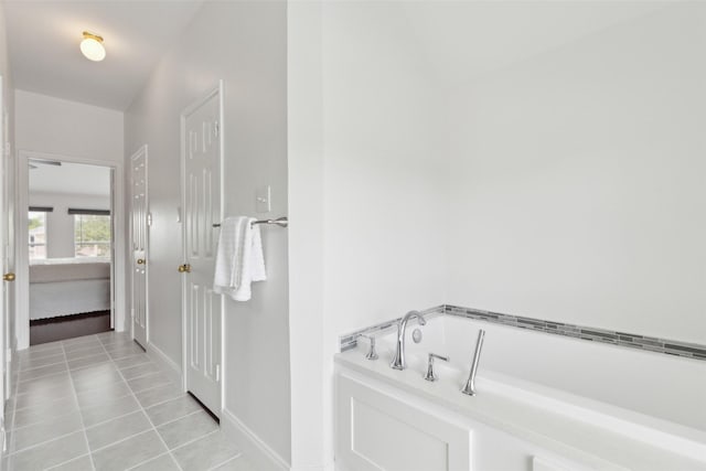1406 Springmeadow Dr, Allen, TX 75002 - bathroom with tile patterned floors, a garden tub, and baseboards