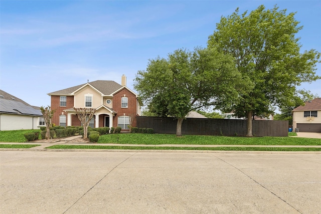 1406 Springmeadow Dr, Allen, TX 75002 - view of front of home featuring fence, brick siding, and a chimney