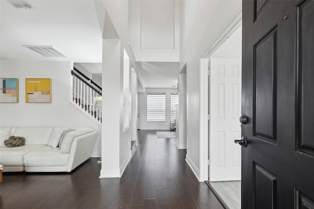 1406 Springmeadow Dr, Allen, TX 75002 - entrance foyer featuring dark wood-style floors, baseboards, and stairs