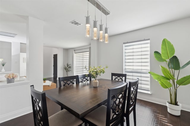 1406 Springmeadow Dr, Allen, TX 75002 - dining room with baseboards and dark wood-style flooring