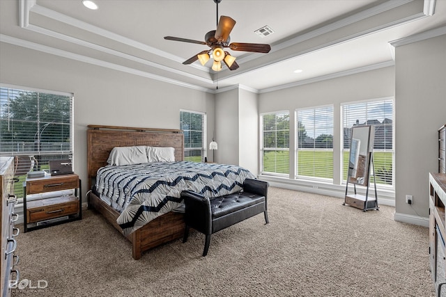 221 Cattail Trl, Benton, LA 71006 - carpeted bedroom featuring a ceiling fan, baseboards, a tray ceiling, visible vents, and ornamental molding