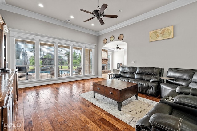 221 Cattail Trl, Benton, LA 71006 - living area with a ceiling fan, ornamental molding, hardwood / wood-style floors, and a fireplace