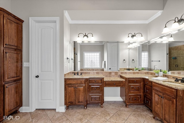 221 Cattail Trl, Benton, LA 71006 - bathroom with a sink, ornamental molding, double vanity, and tiled shower