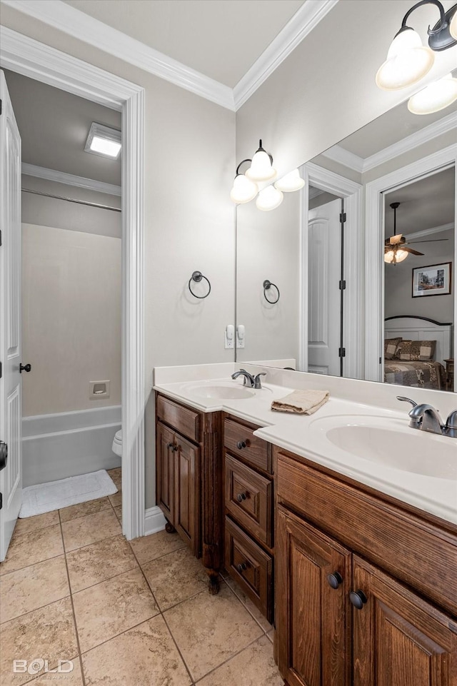 221 Cattail Trl, Benton, LA 71006 - bathroom featuring double vanity, a sink, ceiling fan, and ornamental molding