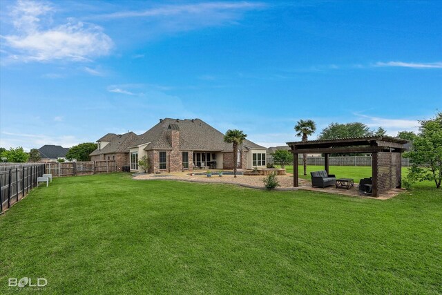 221 Cattail Trl, Benton, LA 71006 - back of property with a pergola, brick siding, a fenced backyard, a lawn, and a patio