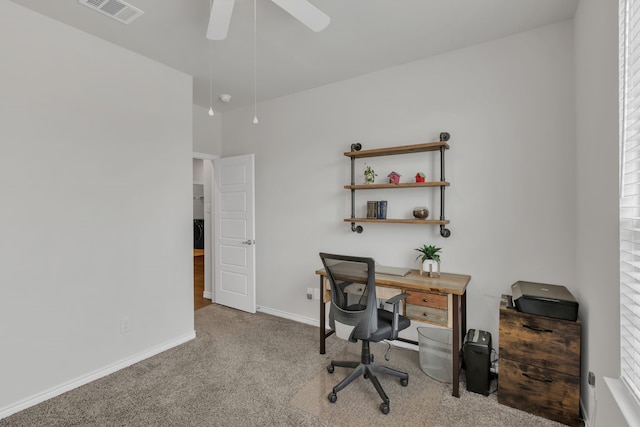 office with carpet floors, a ceiling fan, baseboards, and visible vents