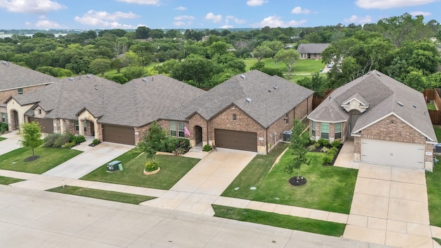 drone / aerial view with a residential view