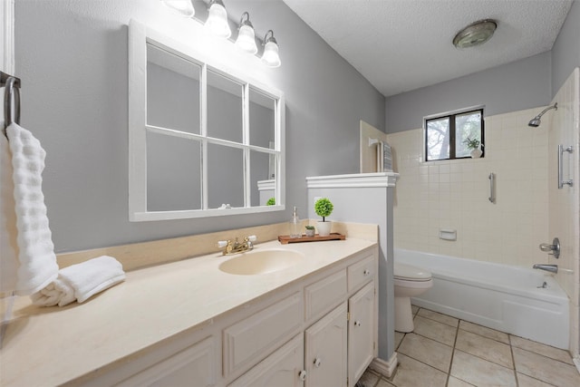 full bath with a textured ceiling, bathtub / shower combination, vanity, tile patterned floors, and toilet