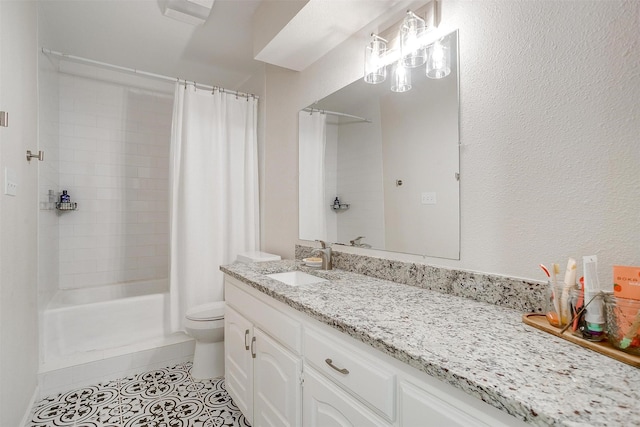 full bath with vanity, tile patterned floors, toilet, and a shower stall